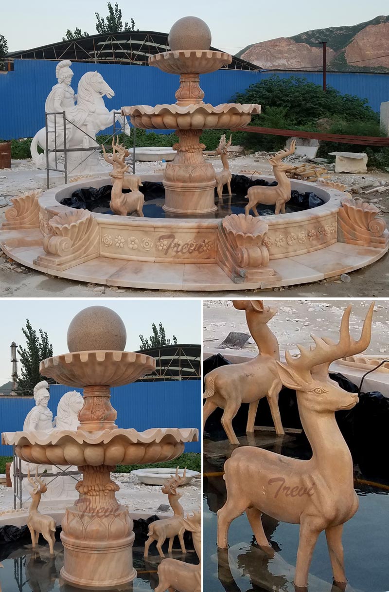 Backyard tiered rolling marble ball fountain with stag statues detail
