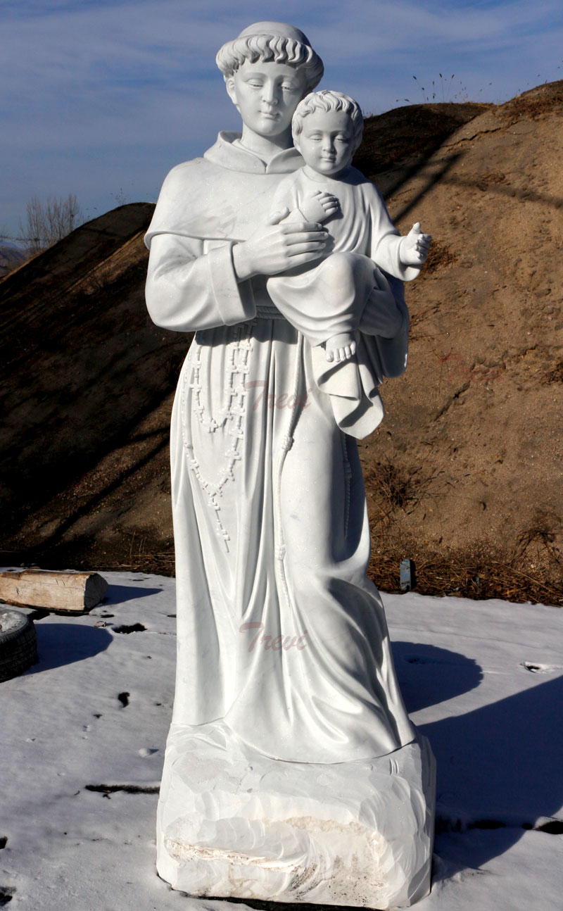 Catholic garden sculptures of saint Anthony with child jesus design details
